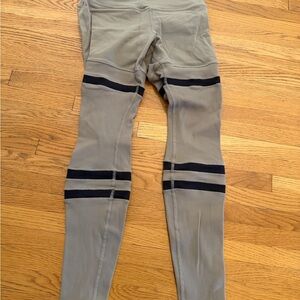 ALO Yoga airlift beige and black ribbed striped leggings